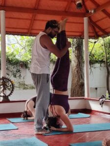 Achu Samya retreats 2025 yoga and ayurveda headstand